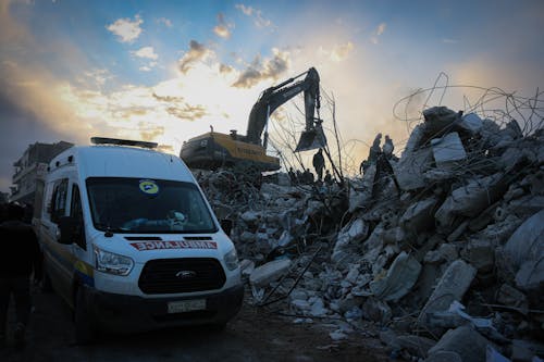 Kostenloses Stock Foto zu beruf im rettungsdienst, bulldozer, dämmerung