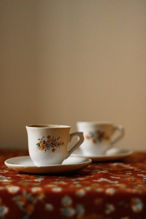 Coffee Cups with Floral Patterns on a Table