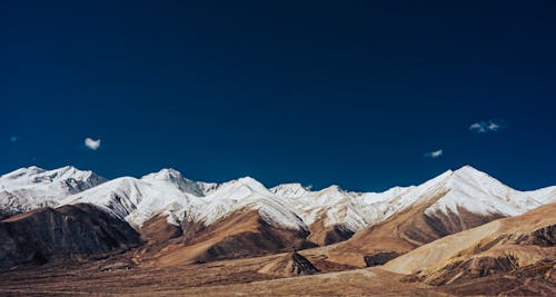 Бесплатное стоковое фото с Аэрофотосъемка, голубое небо, горы