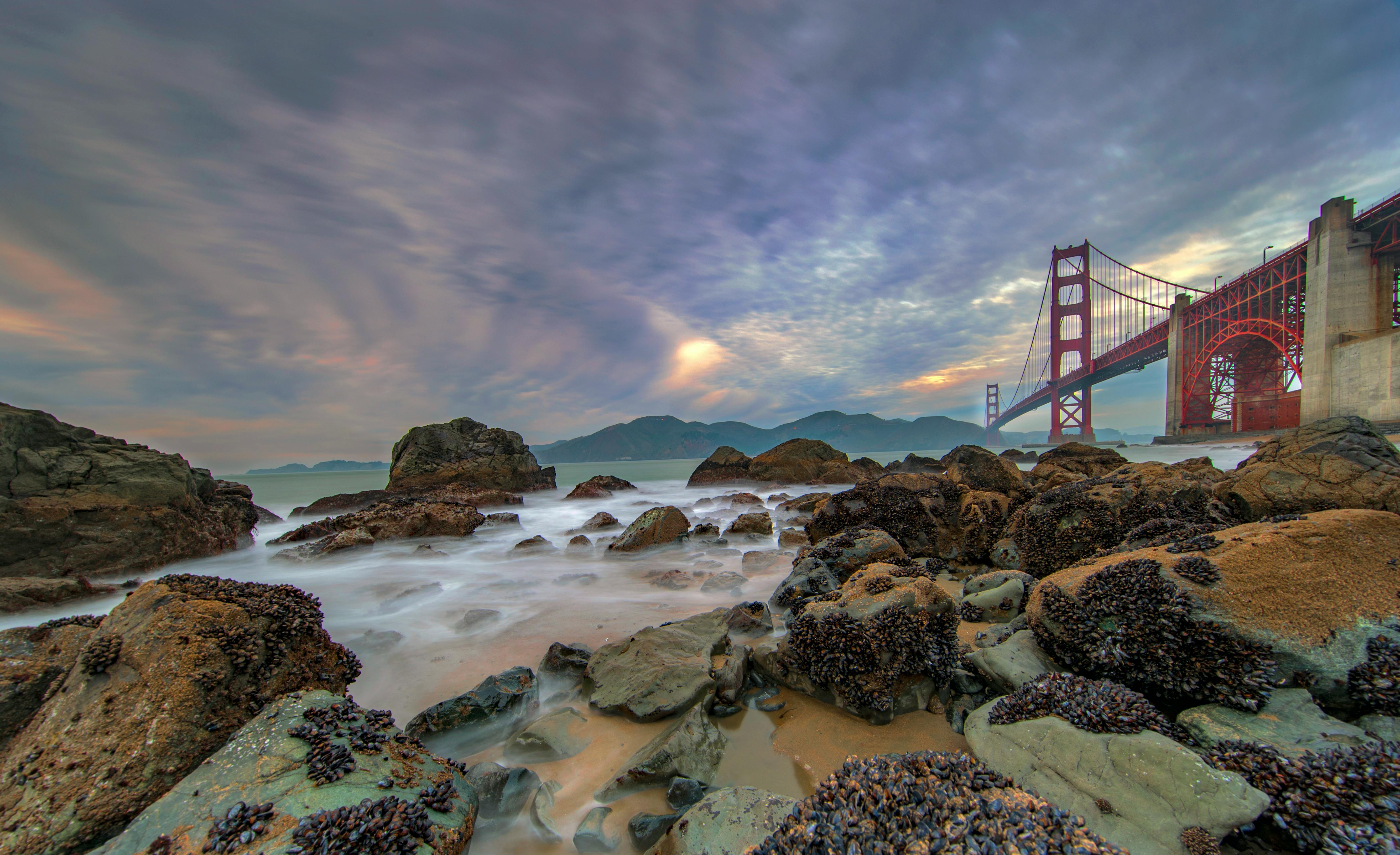 Free stock photo of beach, boulders, bridge, cloud formation