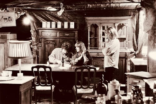 Couple Sit in Old-fashioned Restaurant