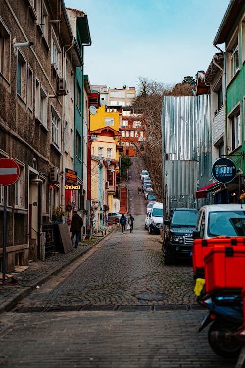 Cars Parked by Street in Town