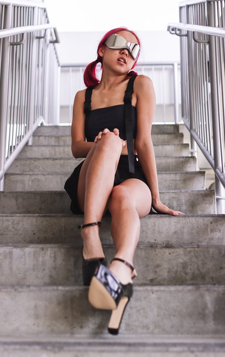 Teenager Girl Sitting On Steps