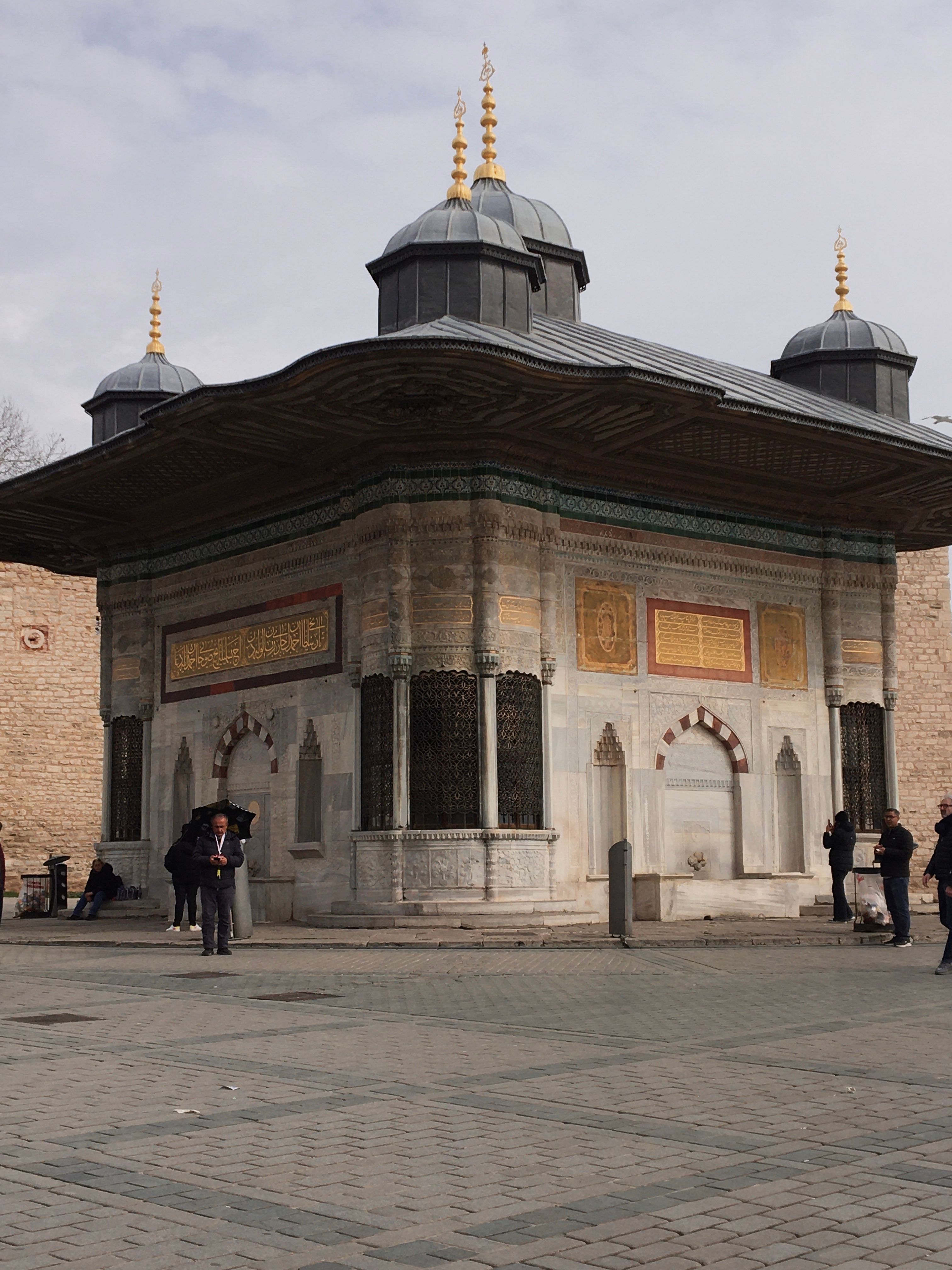 Ottoman architecture of the Fountain of Ahmed III, an iconic landmark in Istanbul's Fatih district.