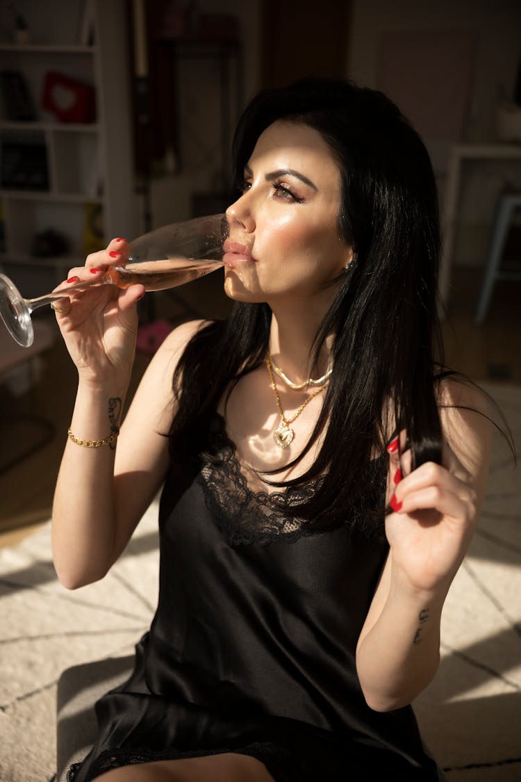 Woman Drinking Champagne