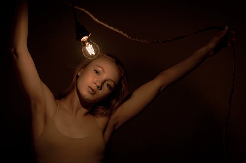Portrait of Woman with Light Bulb