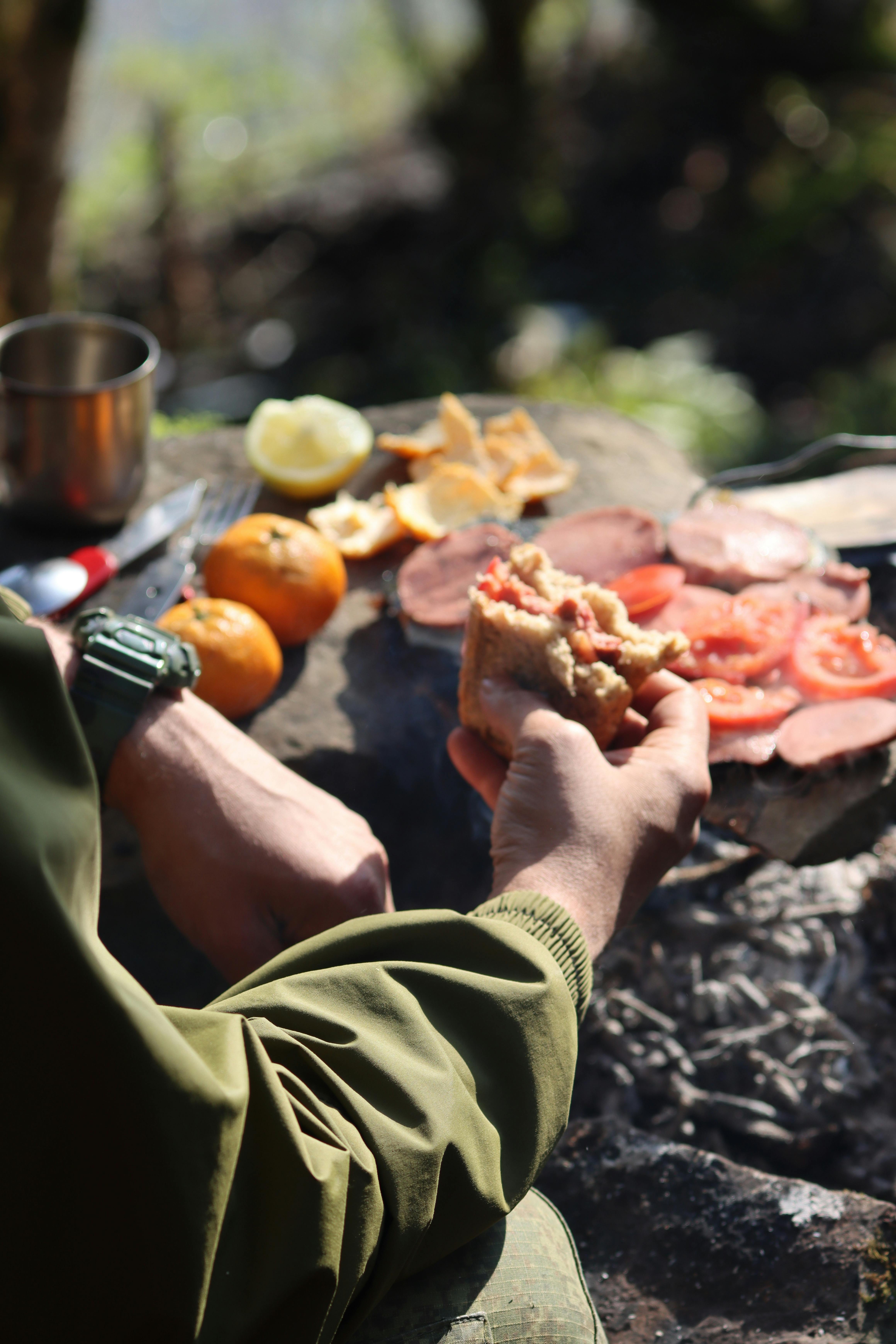 Pizza Slice in Hand · Free Stock Photo