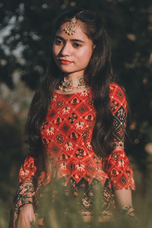 Girl in Traditional Clothing and with Black Hair