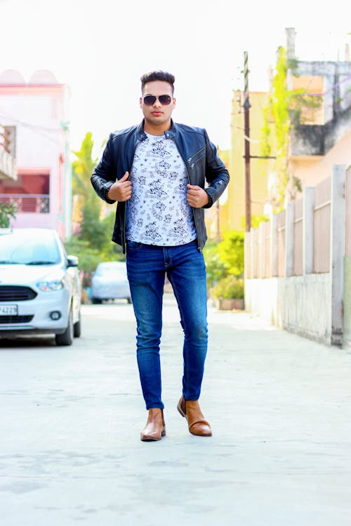 Stylish Man in Sunglasses Walking on Street