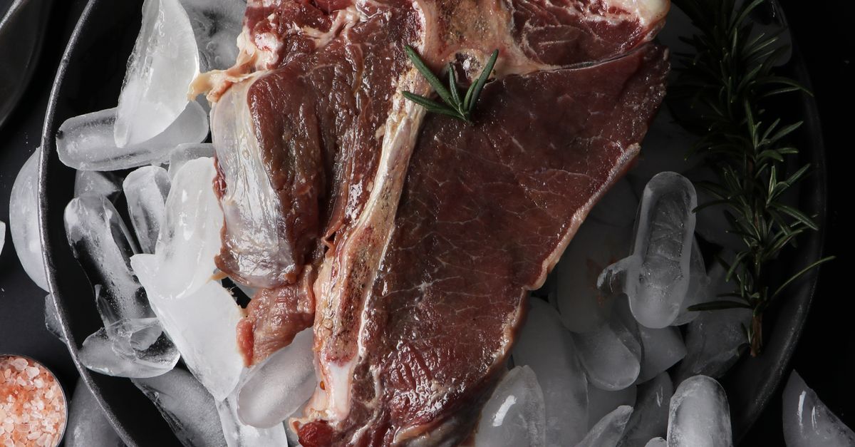 Raw T Bone Steak On Ice Cubes Free Stock Photo raw-t-bone-steak-on-ice-cubes-free-stock-photo