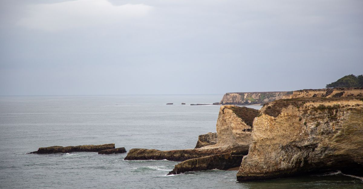 Over Cliffs Clouds over Cliffs on Sea Shore · Free Stock Photo