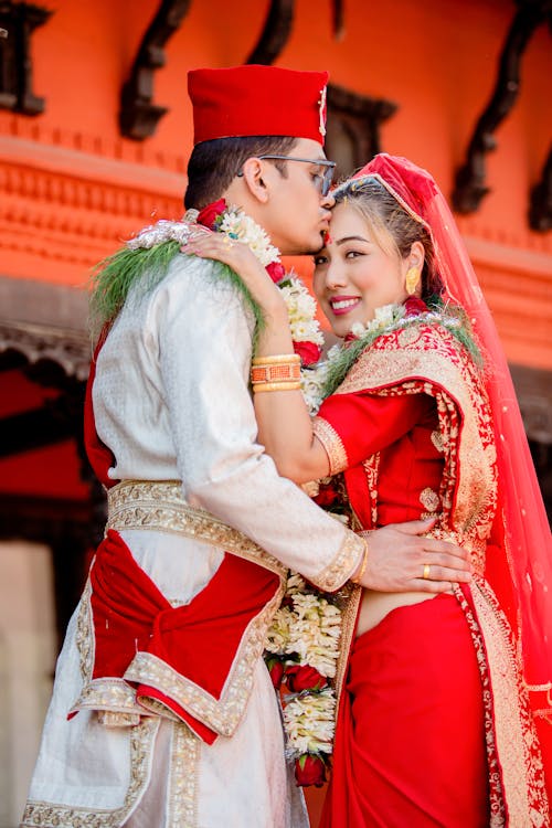 Couple wearing Traditional Wedding Clothing