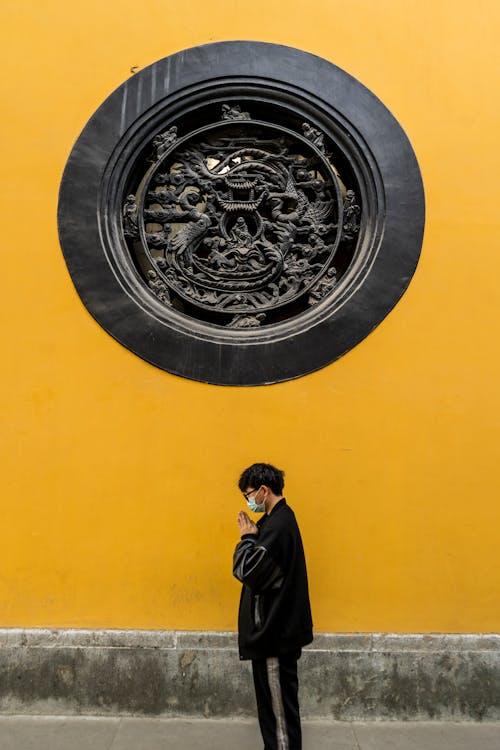 Man Praying on Street