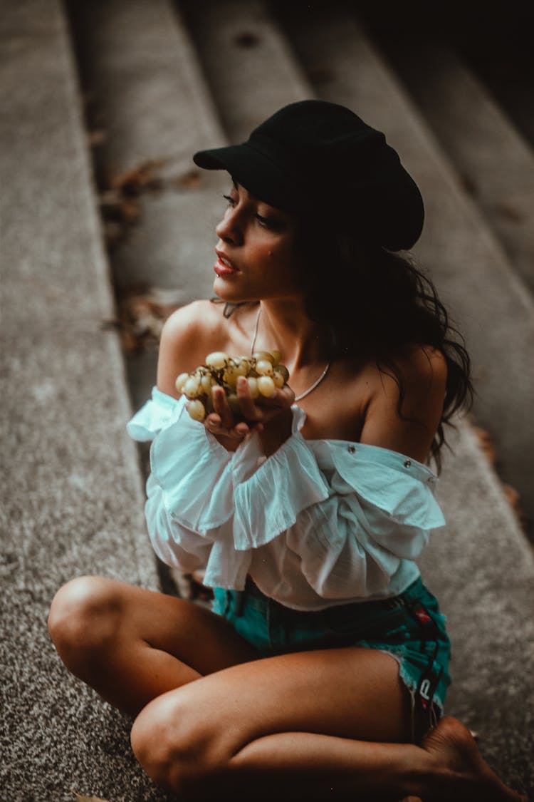 Girl Sitting On The Steps 