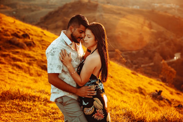 Photo Of A Couple At Sunset 