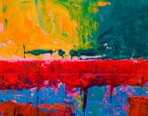 这幅抽象画在画布上以动态而多彩的笔触和充满活力的色调，展现出大胆而丰富的视觉效果