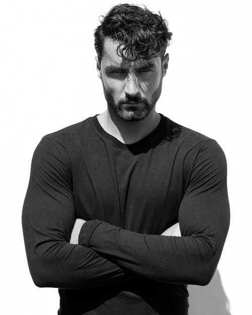 Free Muscular Man in Sweater Stock Photo