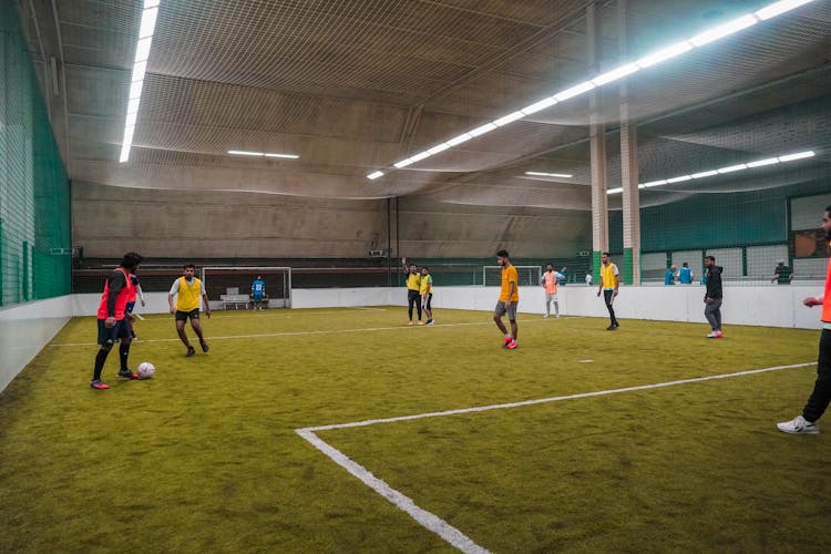 Men Playing Indoor Football