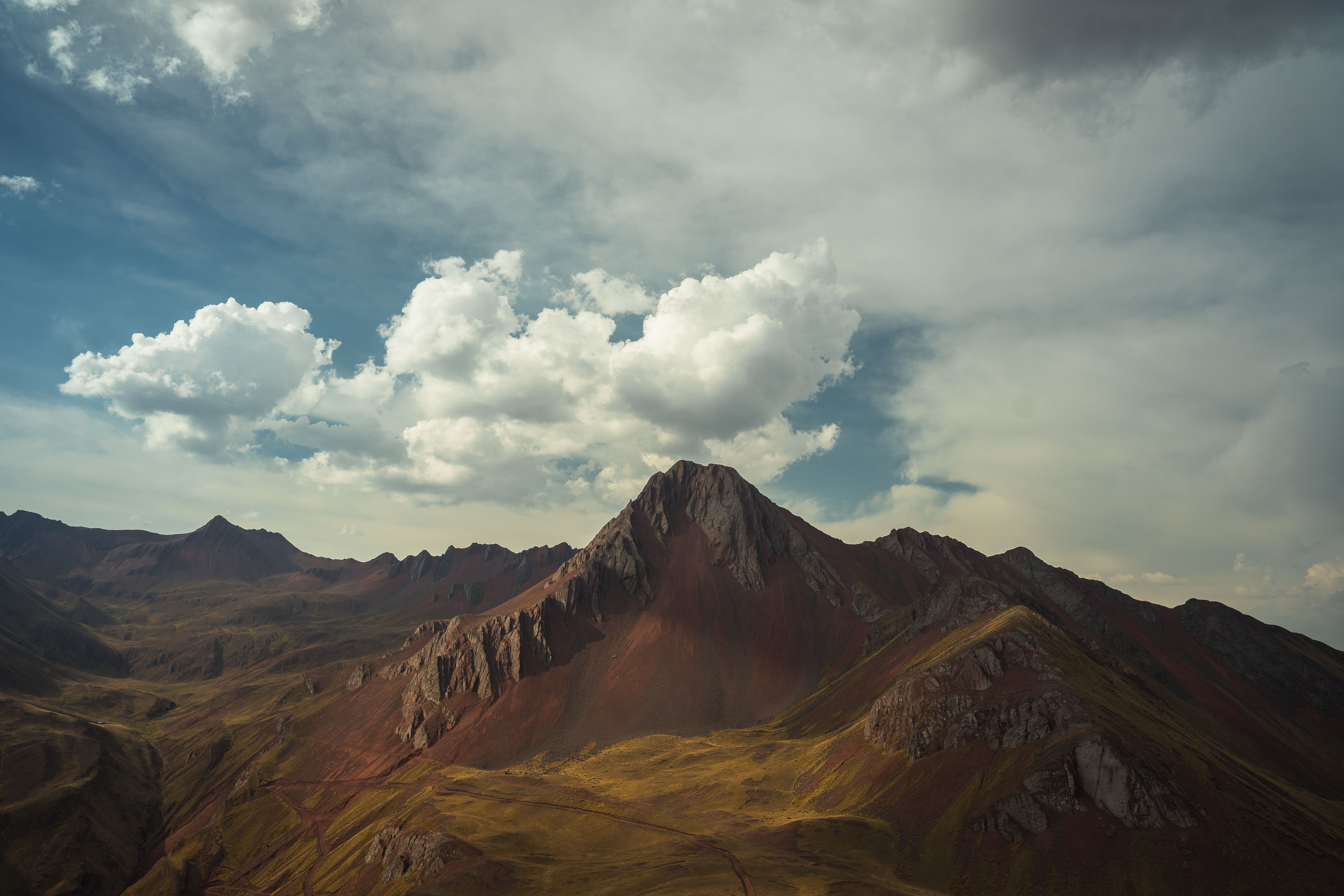 Amazing Amazing Jungle 3Days 2Nights - Amazon Wonder Expeditions Review 2026 - Dramatic landscape of the Andes mountains under a cloudy sky in Cuzco, Peru.