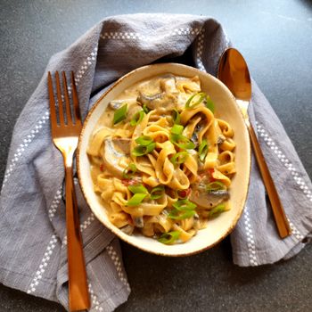 Fish And Noodles With Mushroom Sauce