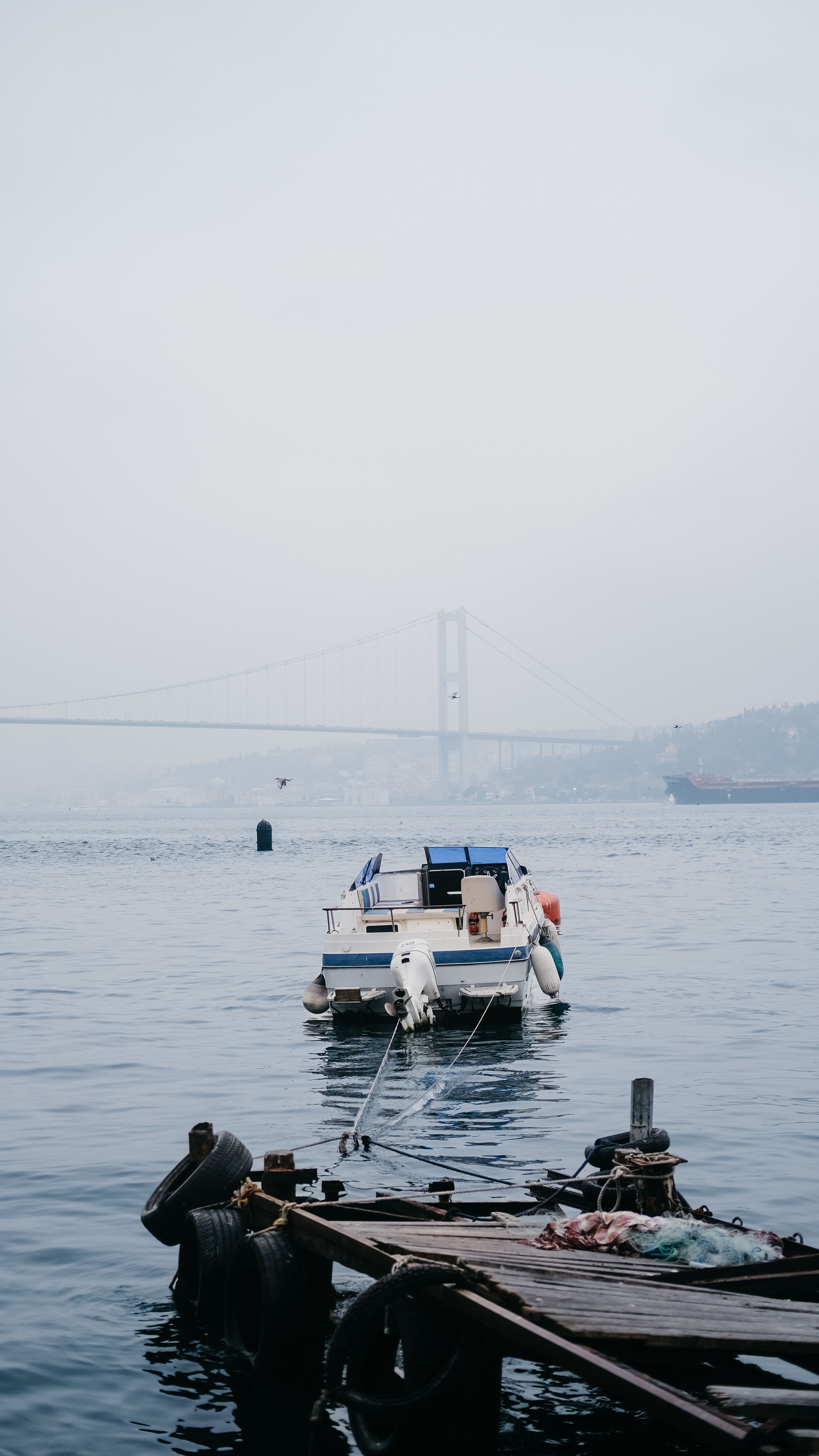 Motorboat Moored on Istanbul Shore under Fog · Free Stock Photo
