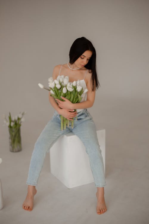 Woman Posing with Flowers