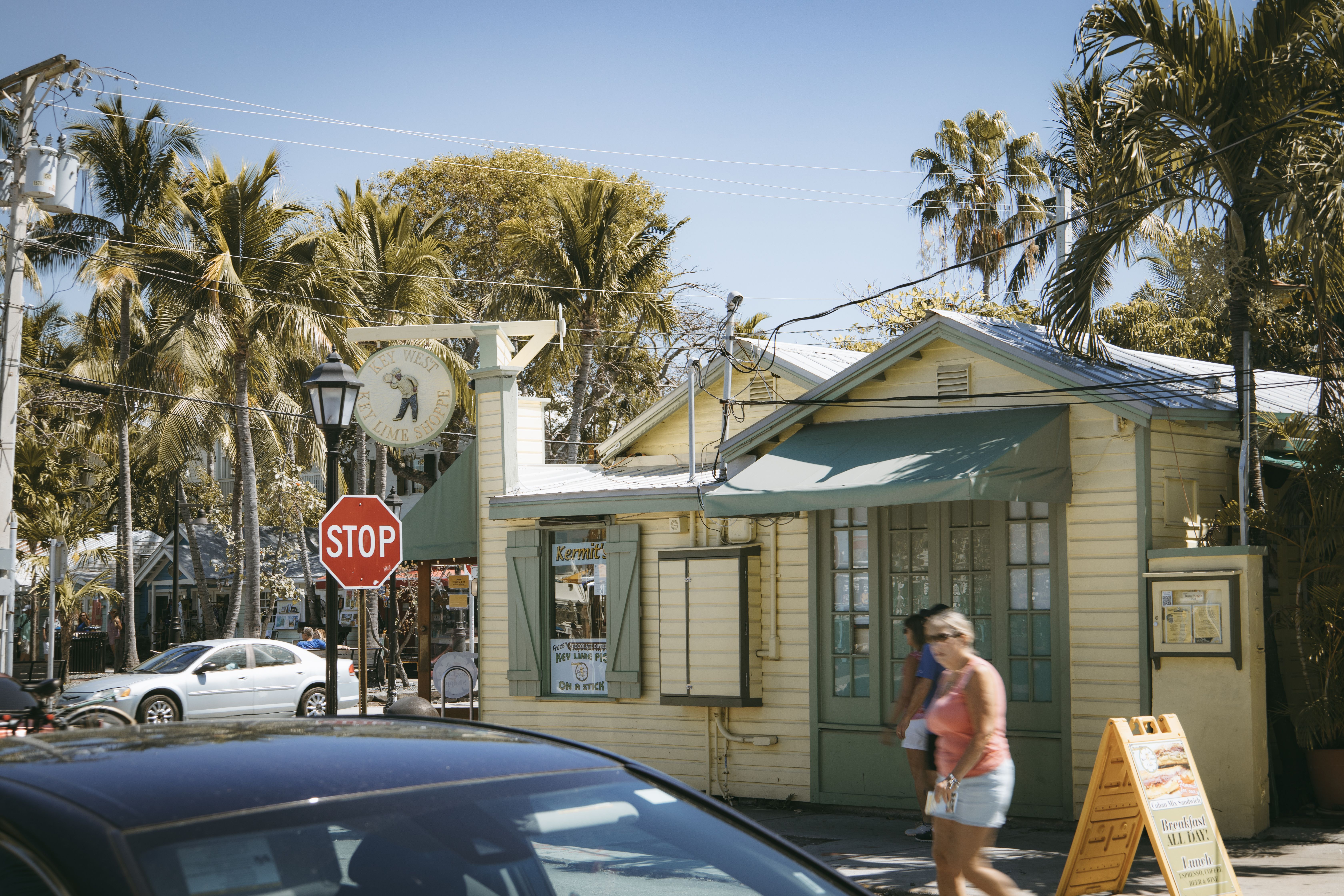 Historic Key West home with lush greenery and a classic porch