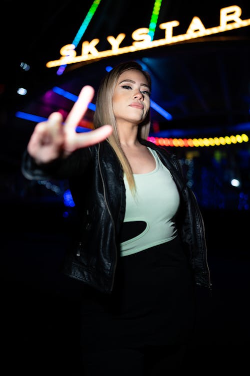 Blonde Woman Posing in Jacket