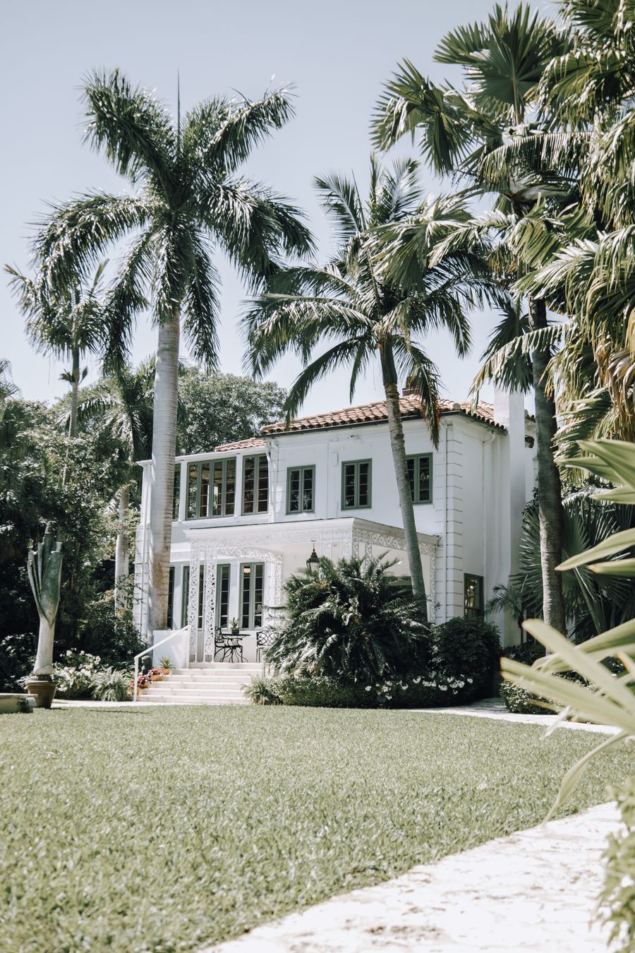 Mediterranean style mansion with gardens and mature palms
