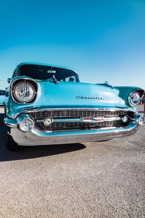 Free Capture of a vintage blue Chevrolet car in bright daylight at West Palm Beach. Stock Photo