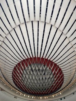 Modern architecture ceiling with futuristic design at Xiqu Centre, Hong Kong.