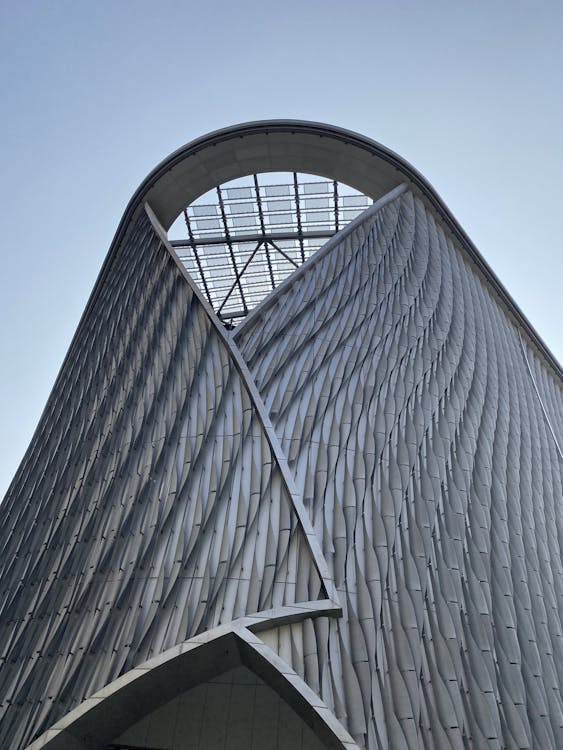 Modern Geometric Building against Blue Sky