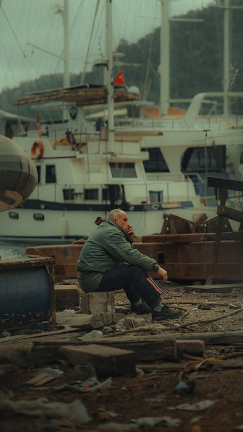 Kostenloses Stock Foto zu mann, müll, schiff