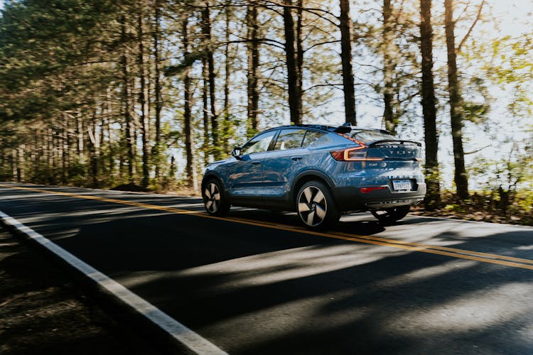 Blue Volvo C40 Recharge On An Asphalt Road 