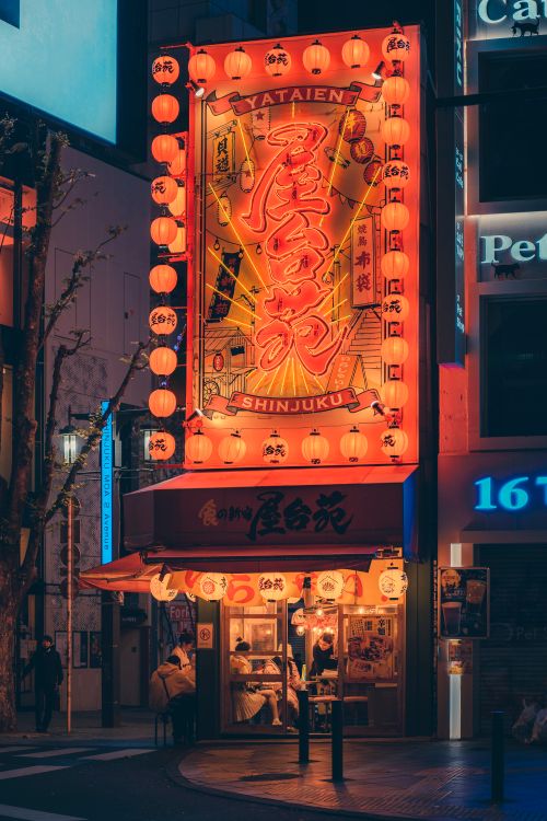 Billboard with Japanese Writing on the Building Facade · Free Stock Photo