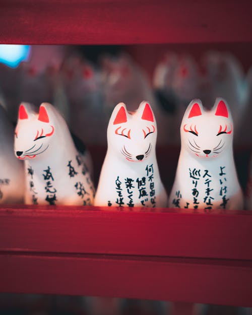 Three Cat Figurines with Japanese Script