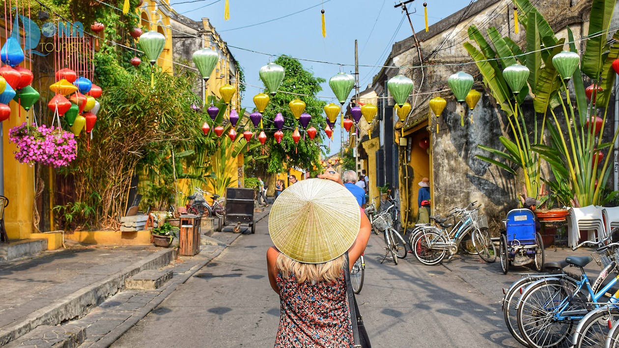 Free Woman Wearing Straw Hat In The Middle Of Road Stock Photo