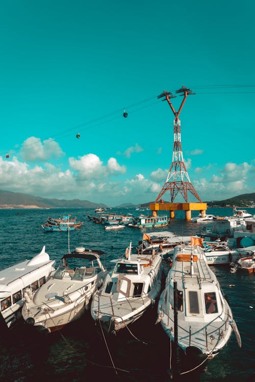 Cable Cart Heading Toward Tower Above Boats