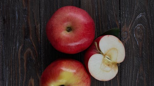 Apples Lying on Wooden Table