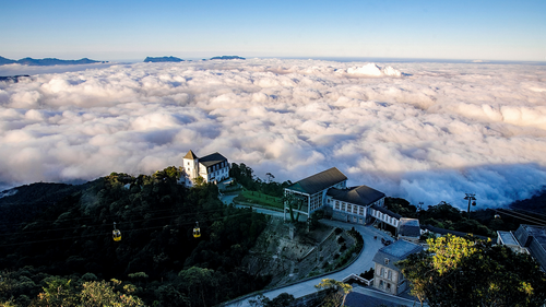 Free Stunning aerial view of Đắk Ya, Gia Lai, with sea of clouds and architecture. Stock Photo