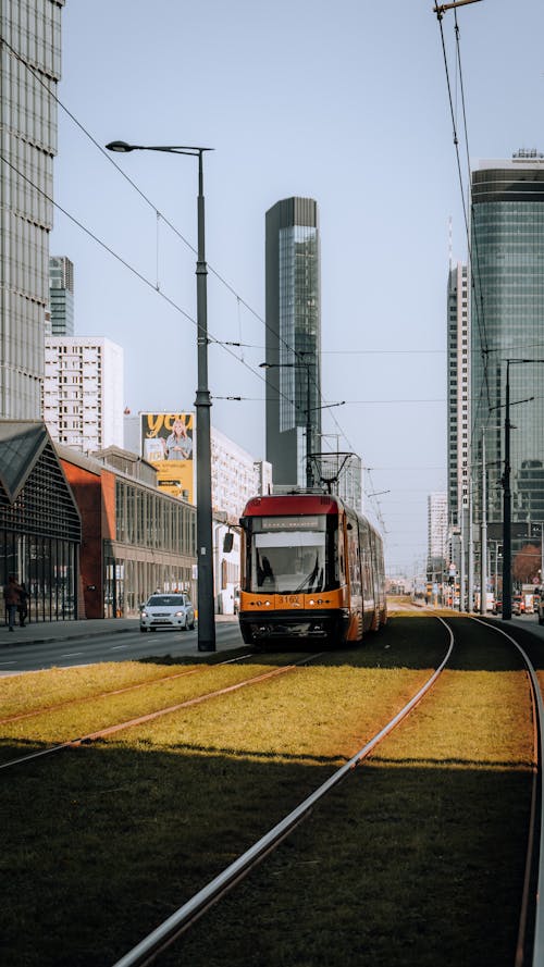 Tram Under the Skysawa Skyscraper in Warsaw