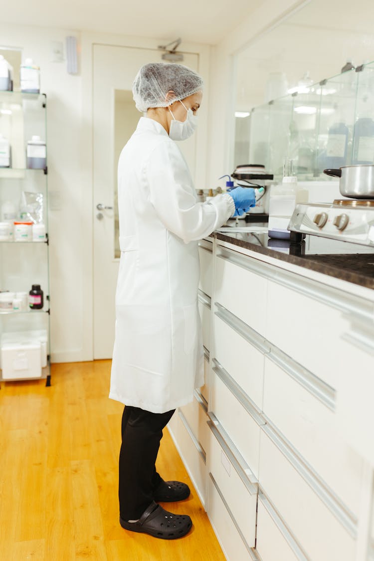 Woman In A Lab Coat In A Laboratory 