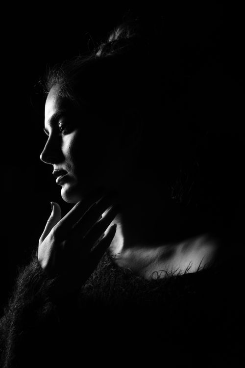 Woman Portrait in Darkness · Free Stock Photo