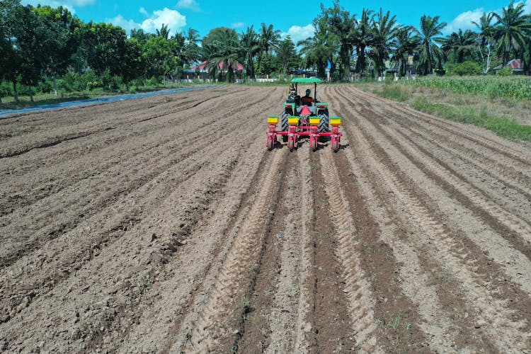 Tractor Plowing Field