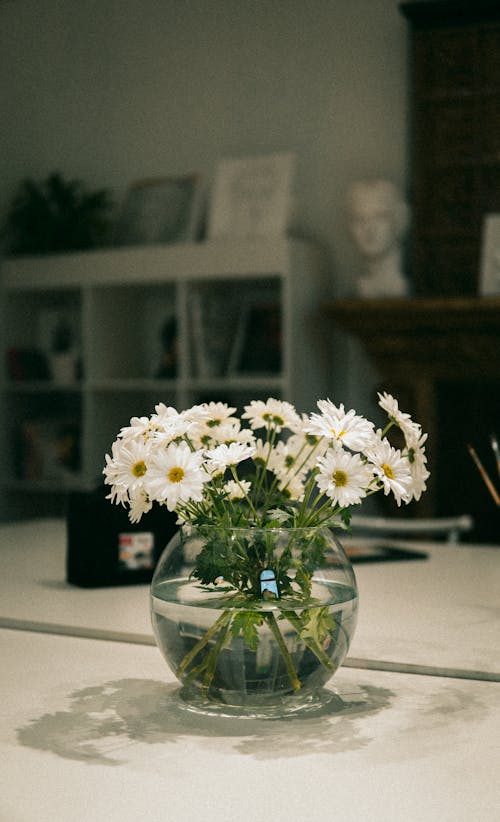Photo of a Bouquet of White Flowers in a Glass Vase