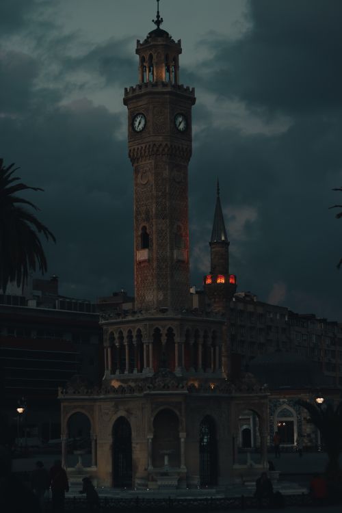 Free Dramatic evening view of the iconic Izmir Clock Tower in Konak Square, Türkiye. Stock Photo