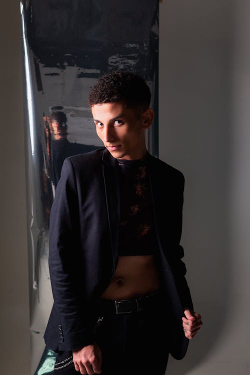 Young Man in Suit Posing in Studio
