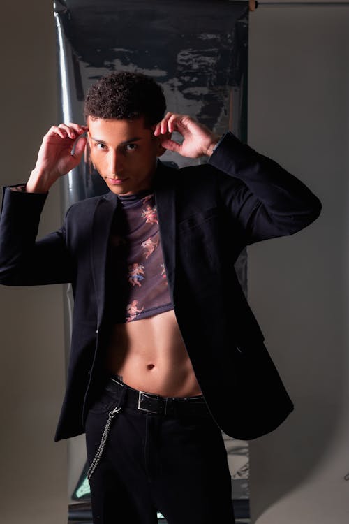 Young Man Posing in Suit in Studio