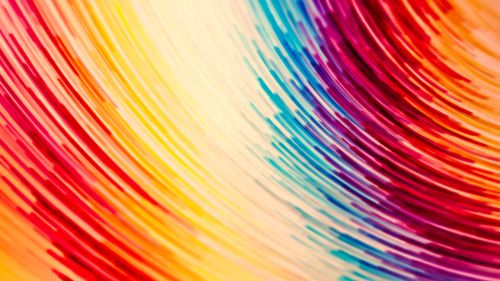 Free Dynamic swirl of vivid colors creating a stunning abstract artwork with flowing motion effect. Stock Photo