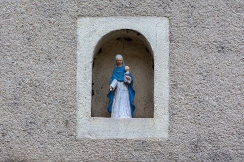 Figurine of Virgin Mary with Baby Jesus on Wall